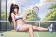 A woman sitting on a tennis court holding a tennis racket.